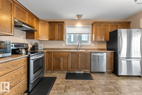 705 Robin Close E, Cold Lake, AB - Indoor Photo Showing Kitchen With Double Sink