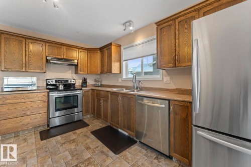 705 Robin Close E, Cold Lake, AB - Indoor Photo Showing Kitchen With Double Sink
