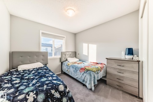 View of carpeted bedroom - 1002 Stillwater Boulevard, Edmonton, AB - Indoor Photo Showing Bedroom