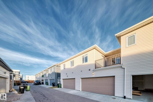 View of asphalt road - 1002 Stillwater Boulevard, Edmonton, AB - Outdoor With Balcony With Exterior
