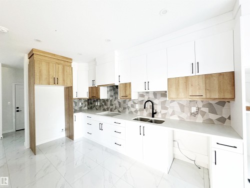 1314 35 Street, Edmonton, AB - Indoor Photo Showing Kitchen With Double Sink