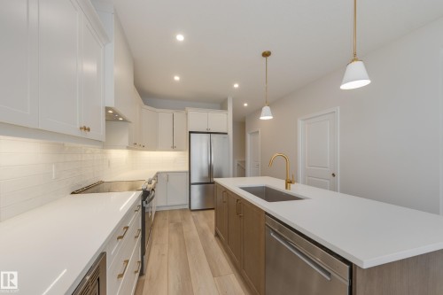 195 Stonehouse Way, Leduc, AB - Indoor Photo Showing Kitchen With Stainless Steel Kitchen With Upgraded Kitchen