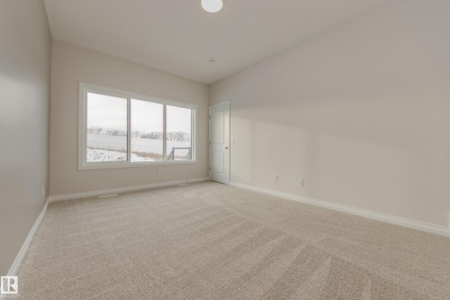 195 Stonehouse Way, Leduc, AB - Indoor Photo Showing Other Room