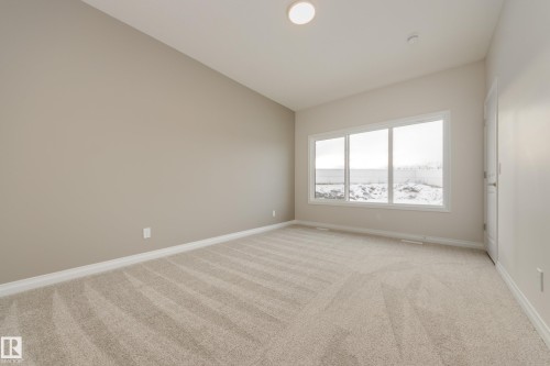 195 Stonehouse Way, Leduc, AB - Indoor Photo Showing Other Room