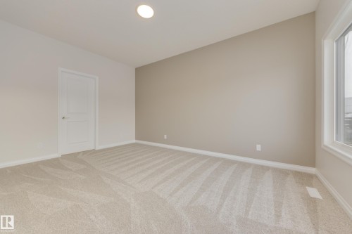 195 Stonehouse Way, Leduc, AB - Indoor Photo Showing Other Room