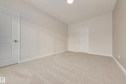 195 Stonehouse Way, Leduc, AB - Indoor Photo Showing Other Room