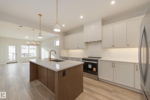 195 Stonehouse Way, Leduc, AB - Indoor Photo Showing Kitchen With Upgraded Kitchen