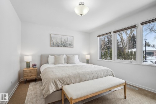 Bedroom featuring carpet flooring and baseboards - 14018 100 Avenue, Edmonton, AB - Indoor Photo Showing Bedroom