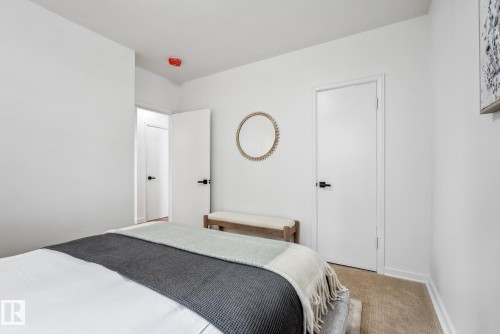 Bedroom featuring carpet floors and baseboards - 14018 100 Avenue, Edmonton, AB - Indoor Photo Showing Bedroom