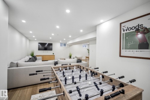 Rec room featuring recessed lighting and wood finished floors - 14018 100 Avenue, Edmonton, AB - Indoor