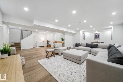 Living room with wood finished floors and recessed lighting - 14018 100 Avenue, Edmonton, AB - Indoor Photo Showing Living Room