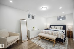 Bedroom featuring recessed lighting and wood finished floors - 