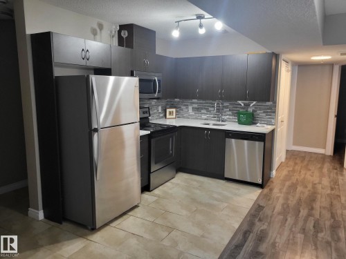 8607 108A Street, Edmonton, AB - Indoor Photo Showing Kitchen With Stainless Steel Kitchen With Upgraded Kitchen