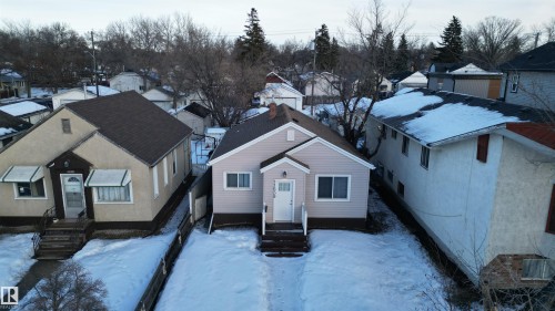 View of front of house featuring a residential view and entry steps - 11539 101 Street, Edmonton, AB - Outdoor With Facade