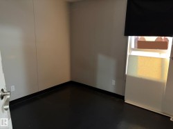 Unfurnished room with concrete flooring - 