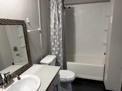 Full bath with shower / bath combo and vanity - 