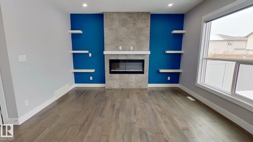 3016 12 Avenue, Edmonton, AB - Indoor Photo Showing Other Room With Fireplace
