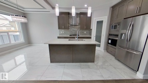 3016 12 Avenue, Edmonton, AB - Indoor Photo Showing Kitchen With Double Sink