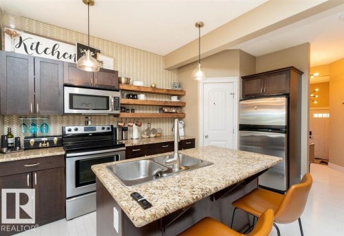 32 15151 43 Street, Edmonton, AB - Indoor Photo Showing Kitchen With Double Sink