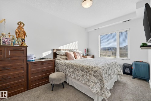218 1316 Windermere Way, Edmonton, AB - Indoor Photo Showing Bedroom