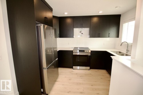 G 3864 Chrustawka Place, Edmonton, AB - Indoor Photo Showing Kitchen With Double Sink