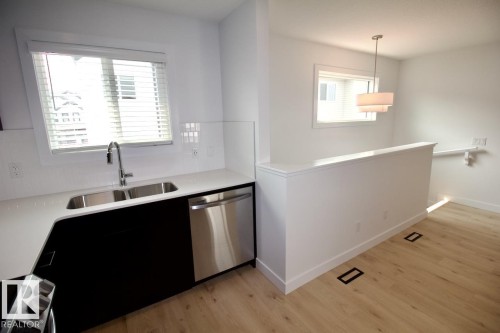 G 3864 Chrustawka Place, Edmonton, AB - Indoor Photo Showing Kitchen With Double Sink