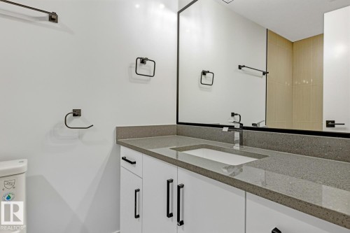 Empty room with light wood-style floors and baseboards - 9627 152 Street Nw, Edmonton, AB - Indoor Photo Showing Other Room