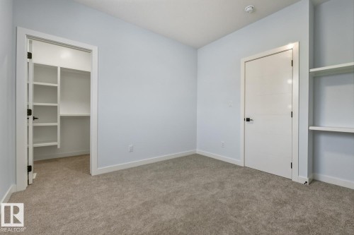 Unfurnished bedroom with light wood-style floors and recessed lighting - 9627 152 Street Nw, Edmonton, AB - Indoor Photo Showing Other Room