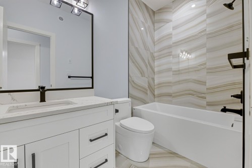 Spare room featuring baseboards and light colored carpet - 9627 152 Street Nw, Edmonton, AB - Indoor Photo Showing Other Room