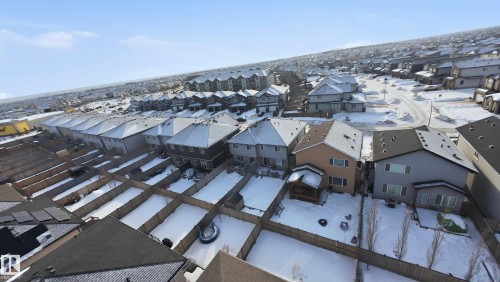 Snowy aerial view featuring a residential view - 5978 167C Avenue, Edmonton, AB - Outdoor With View