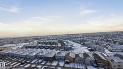 Aerial view at dusk of a residential view - 