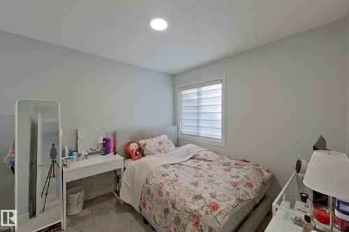 View of carpeted bedroom - 4419 Kinsella Green, Edmonton, AB - Indoor Photo Showing Bedroom