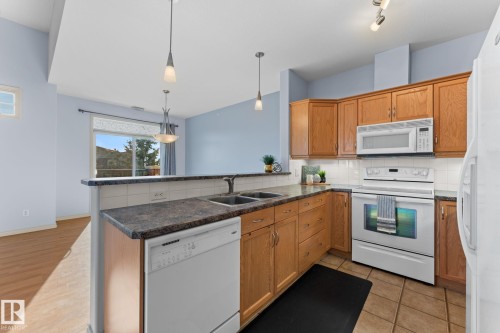 302 2503 Hanna Crescent, Edmonton, AB - Indoor Photo Showing Kitchen With Double Sink