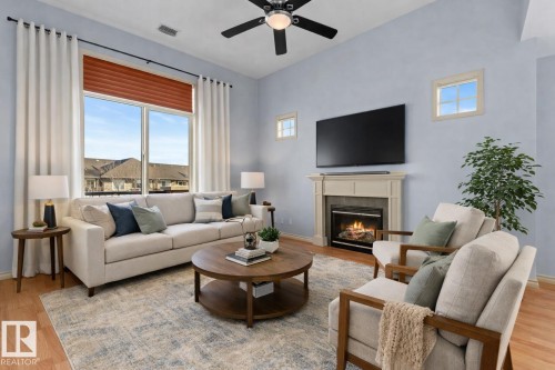 302 2503 Hanna Crescent, Edmonton, AB - Indoor Photo Showing Living Room With Fireplace