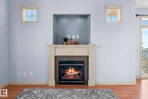 302 2503 Hanna Crescent, Edmonton, AB - Indoor Photo Showing Living Room With Fireplace