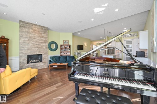 1 7570 May Common, Edmonton, AB - Indoor With Fireplace