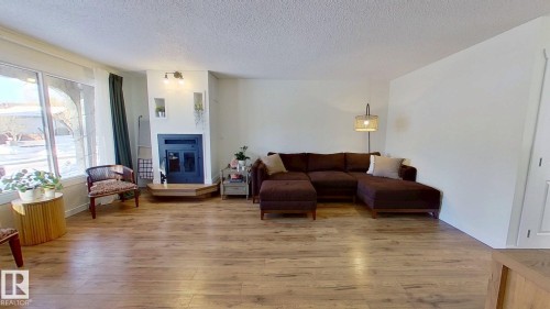 11935 57 Street, Edmonton, AB - Indoor Photo Showing Living Room With Fireplace