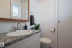 Bathroom featuring vanity and toilet - 