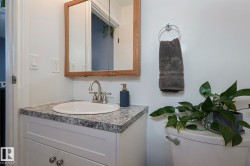 Bathroom featuring vanity and toilet - 