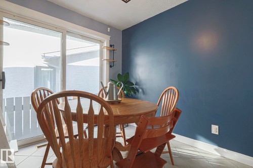 Dining area with baseboards and tile patterned flooring - 192 Dunluce Road, Edmonton, AB - Indoor Photo Showing Dining Room