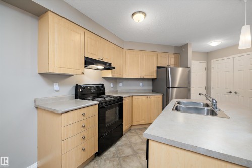 403 622 Mcallister Loop, Edmonton, AB - Indoor Photo Showing Kitchen With Double Sink