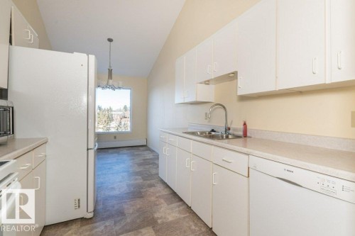 433 4404 122 Street, Edmonton, AB - Indoor Photo Showing Kitchen With Double Sink