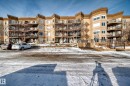 Snow covered property featuring a view of apartment building / complex - 232 530 Hooke Road, Edmonton, AB  - Outdoor With Balcony 