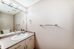 Half bath with vanity and toilet - 