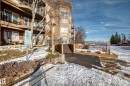 View of property's community featuring stairway - 232 530 Hooke Road, Edmonton, AB  - Outdoor With Balcony 