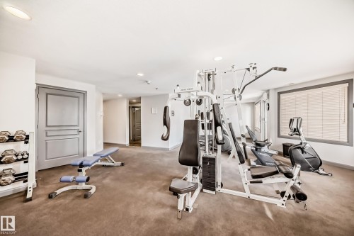 Exercise room featuring recessed lighting - 232 530 Hooke Road, Edmonton, AB - Indoor Photo Showing Gym Room