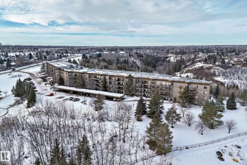 Snowy aerial view featuring a view of apartment building / complex - 232 530 Hooke Road, Edmonton, AB - Outdoor With View