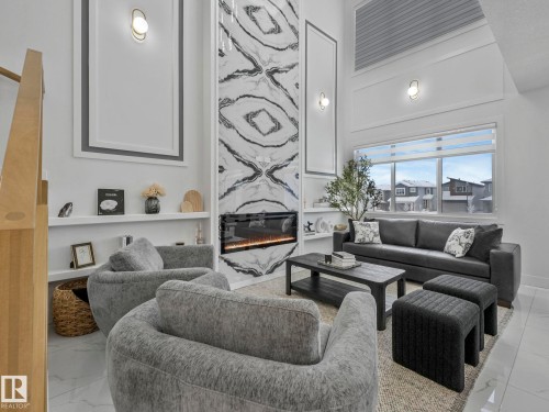 3512 44 Avenue, Beaumont, AB - Indoor Photo Showing Living Room With Fireplace