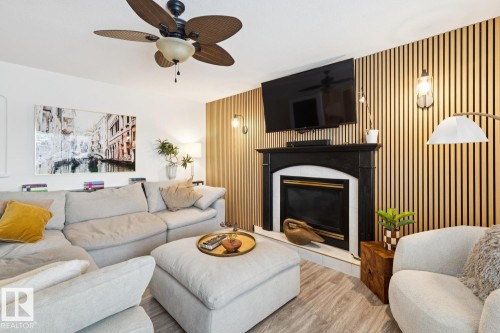 8617 158A Avenue, Edmonton, AB - Indoor Photo Showing Living Room With Fireplace