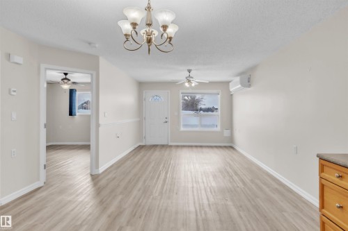 1 5011 Pine Drive, Cherry Grove, AB - Indoor Photo Showing Other Room